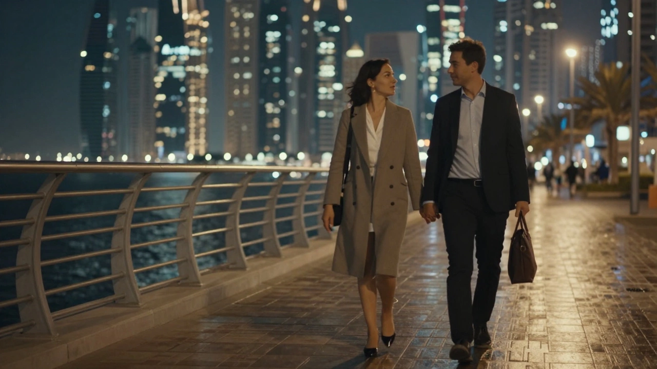 A couple walks calmly along Dubai Marina at night, their connection quiet and respectful.